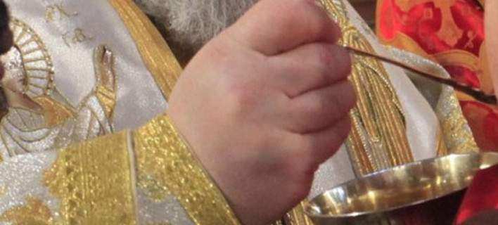 κοινωνούμε