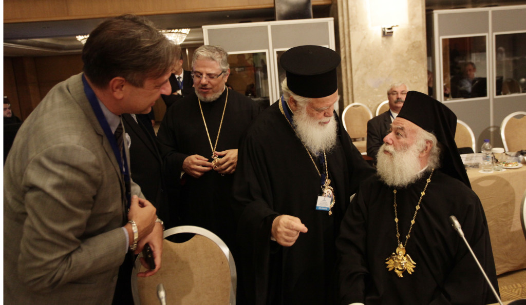 2ç ÄÉÅÈÍÇÓ ÄÉÁÓÊÅØÇ ÁÈÇÍÙÍ ÃÉÁ ÔÏÍ "ÈÑÇÓÊÅÕÔÉÊÏ ÊÁÉ ÐÏËÉÔÉÓÔÉÊÏ ÐËÏÕÑÁËÉÓÌÏ ÊÁÉ ÔÇÍ ÅÉÑÇÍÉÊÇ ÓÕÍÕÐÁÑÎÇ ÓÔÇÍ ÌÅÓÇ ÁÍÁÔÏËÇ" --ÁÐÏÃÅÕÌÁÔÉÍÇ ÓÕÍÅÄÑÉÁÓÇ--ÓÕÌÌÅÔÏ×Ç ÔÏÕ ÏÉÊÏÕÌÅÍÉÊÏÕ ÐÁÔÑÉÁÑ×Ç ÂÁÑÈÏËÏÌÁÉÏÕ--×ÑÇÓÔÏÓ ÌÐÏÍÇÓ