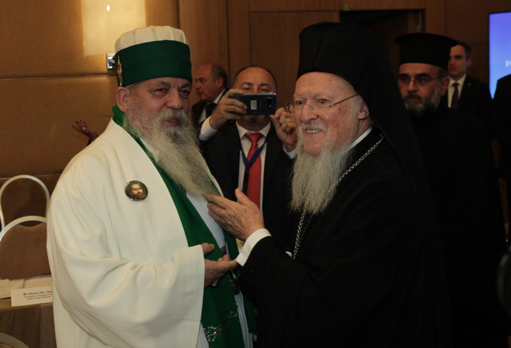 2ç ÄÉÅÈÍÇÓ ÄÉÁÓÊÅØÇ ÁÈÇÍÙÍ ÃÉÁ ÔÏÍ "ÈÑÇÓÊÅÕÔÉÊÏ ÊÁÉ ÐÏËÉÔÉÓÔÉÊÏ ÐËÏÕÑÁËÉÓÌÏ ÊÁÉ ÔÇÍ ÅÉÑÇÍÉÊÇ ÓÕÍÕÐÁÑÎÇ ÓÔÇÍ ÌÅÓÇ ÁÍÁÔÏËÇ" --ÁÐÏÃÅÕÌÁÔÉÍÇ ÓÕÍÅÄÑÉÁÓÇ--ÓÕÌÌÅÔÏ×Ç ÔÏÕ ÏÉÊÏÕÌÅÍÉÊÏÕ ÐÁÔÑÉÁÑ×Ç ÂÁÑÈÏËÏÌÁÉÏÕ--×ÑÇÓÔÏÓ ÌÐÏÍÇÓ